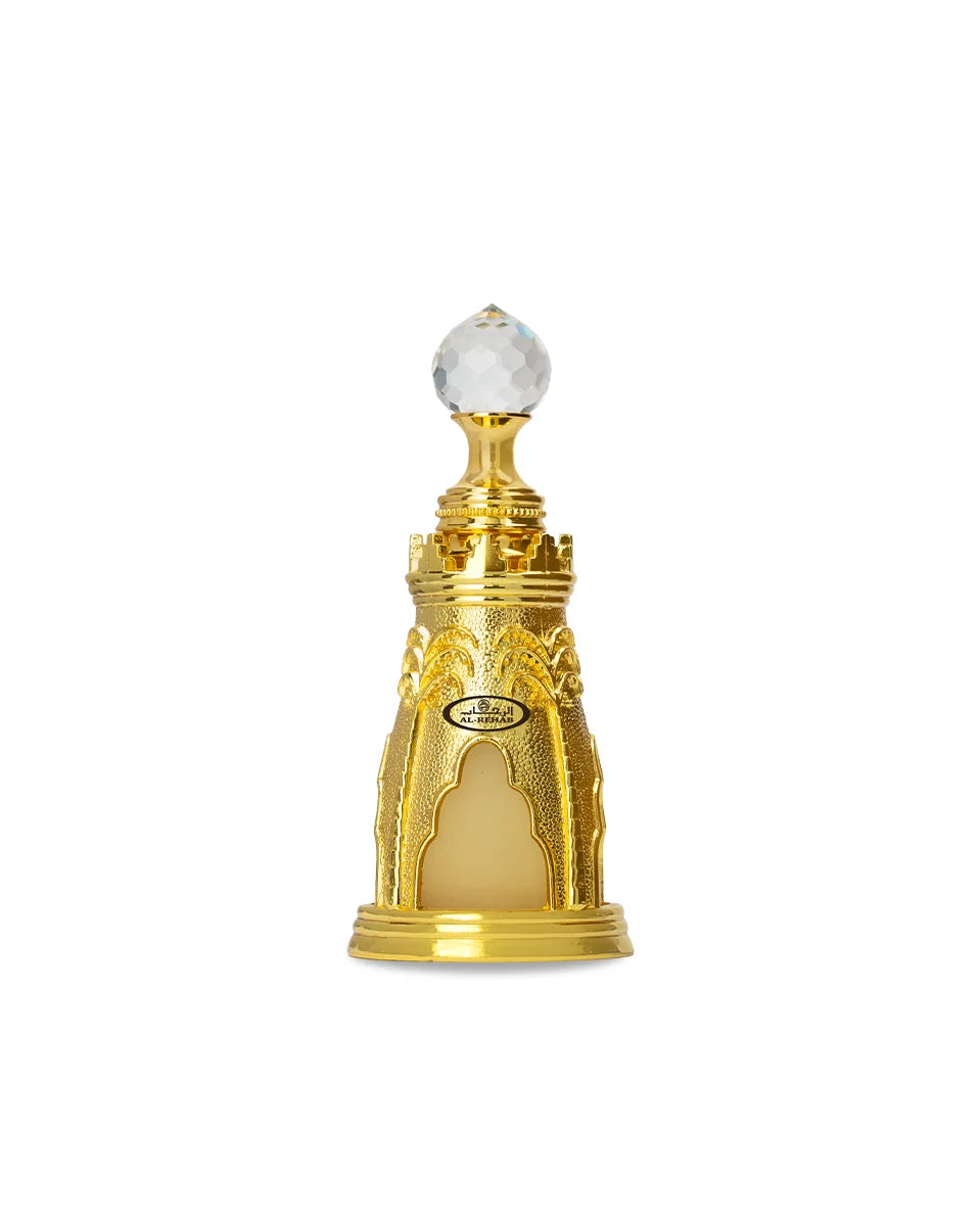 Gold and crystal decorative object on a white background