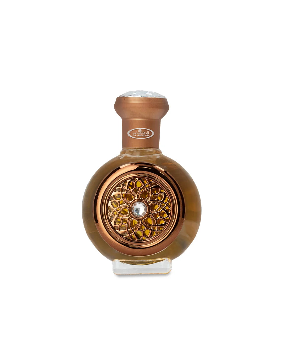 Bronze-colored perfume bottle with intricate design on a white background