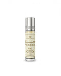 Small perfume bottle labeled 'Aseel' with a silver cap on a white background