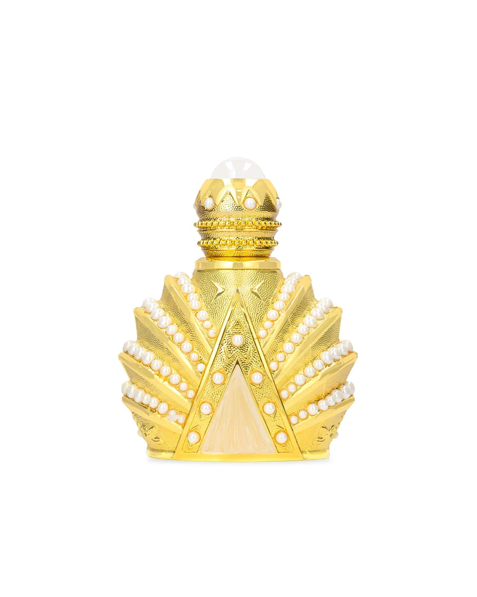Decorative gold bottle with intricate design on a white background