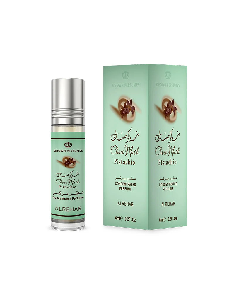Perfume bottle and packaging of Alrehab Chera Misk Pistachio on a white background