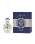 Perfume bottle and packaging with intricate design on a white background