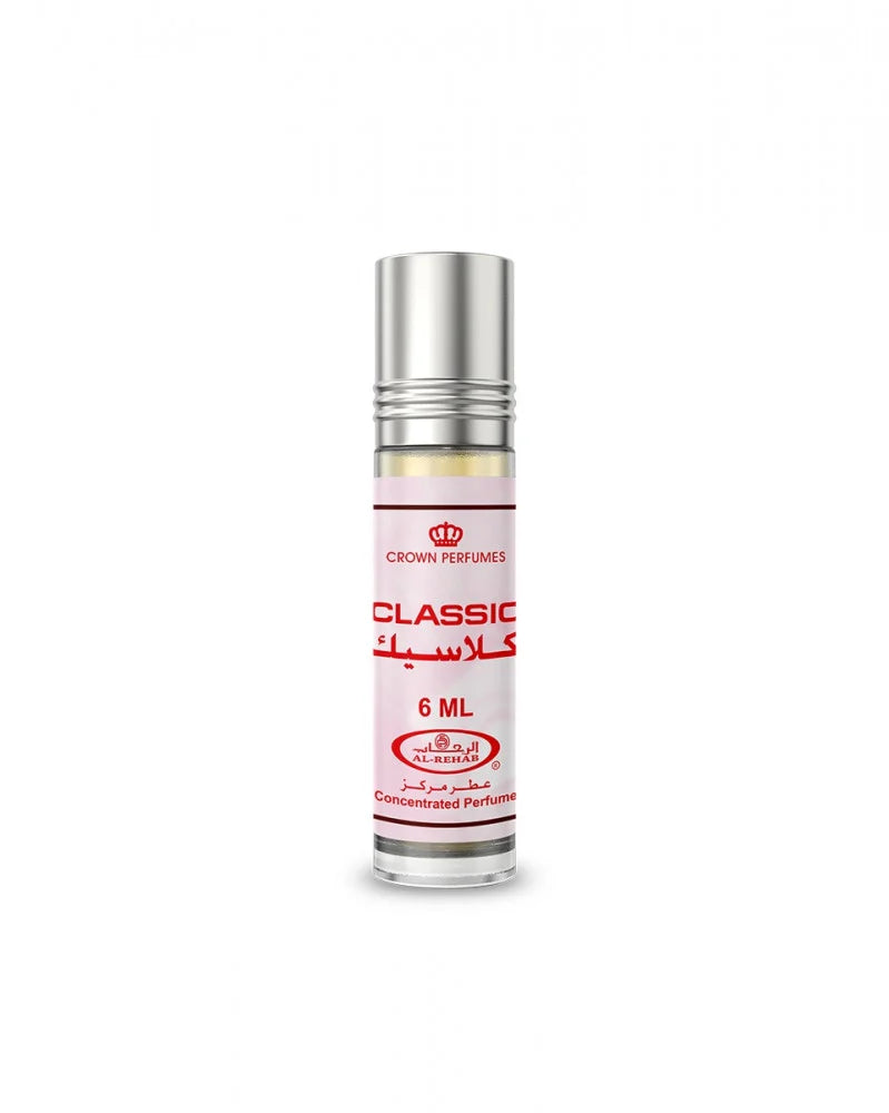 Small perfume bottle with silver cap and red text on a white background